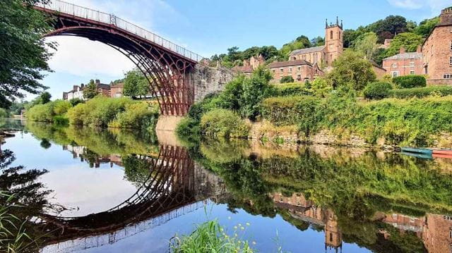 Ironbridge river water trees green houses bridge